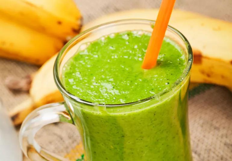 Closeup of a banana kale smoothie