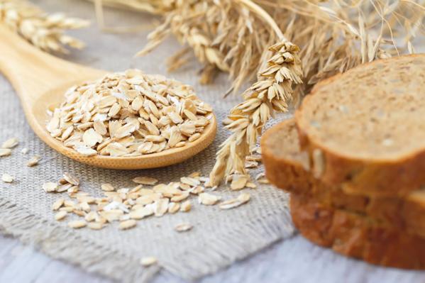 Oats with ears of cereal and bread