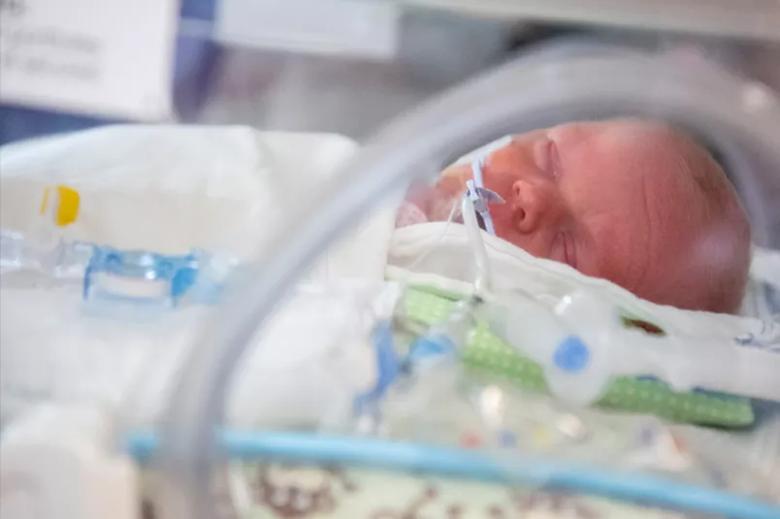 Photo of baby in NICU.